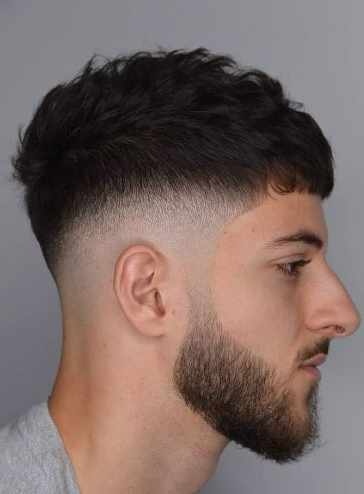 low drop fade French crop with textured fringe on straight hair